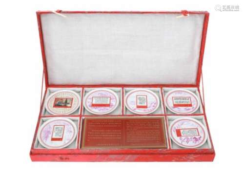 Set of 14 polychrome porcelain dishes, decorated with stamps about chairman Mao's poem and term to
