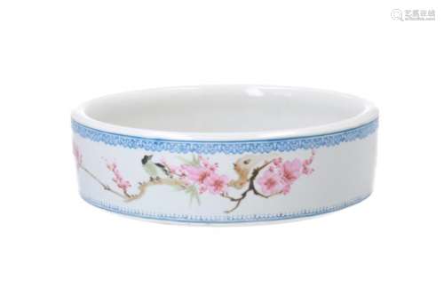 A polychrome porcelain bowl, decorated with a bird, flowers and characters. Marked with seal mark