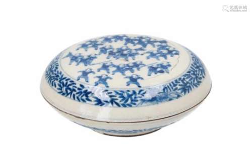 A round blue and white soft-paste lidded box, decorated with little boys. Marked with 6-character