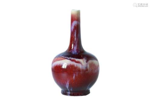 A flambé glazed porcelain longneck vase. Unmarked. China, 20th century. H. 32 cm. Provenance: bought