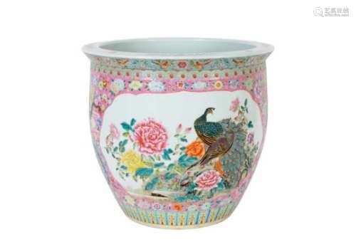 A polychrome porcelain cachepot, decorated with scenes with dragons, birds and flowers. Marked