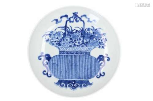 A blue and white porcelain deep dish, decorated with a flower vase. Unmarked. China, 20th century.