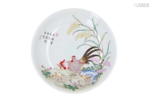 A polychrome porcelain deep dish, decorated with a rooster, chickens and characters. Marked with