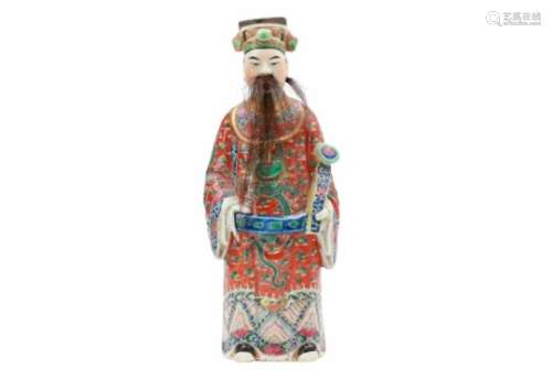 A polychrome porcelain sculpture of a dignitary with ruyi scepter and real hair. Unmarked. China,