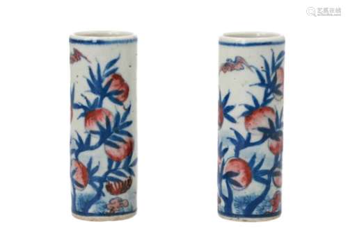 A pair of polychrome porcelain miniature vases, decorated with fruits and bats. Unmarked. China,