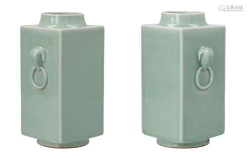 Lot of two celadon glazed porcelain cong vases with grips in the shape of elephants heads holding