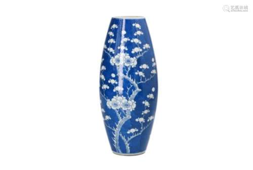 An olive shaped blue and white porcelain vase, decorated with flowers. Marked with 4-character