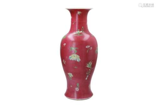 A sgraffiato polychrome porcelain vase, decorated with flowers. Marked with seal mark Qianlong.