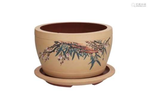 A Duanni Yixing cachepot with dish, decorated with characters and flower branches. Made by Liu.