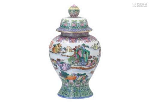 A polychrome porcelain lidded vase, decorated with buildings in a river landscape. Marked with