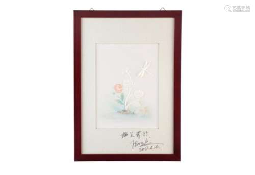 A blanc de Chine porcelain plaque in wooden frame, depicting chrysanthemums and a dragonfly in