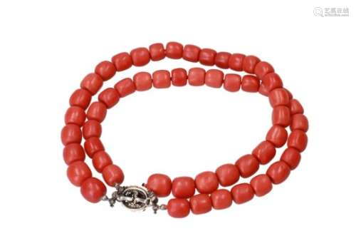 A rare large two-strand red coral necklace with silver and golden clasp, set with a diamond. Diam.