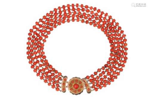 A five-strand red coral necklace with golden clasp, set with red coral. Added 16 loose red coral