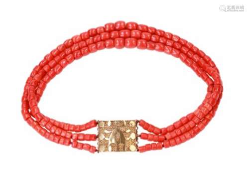 A three-strand red coral necklace with 14-kt gold clasp. Diam. approx. 6,2 - 11,9 mm. Tot. weight