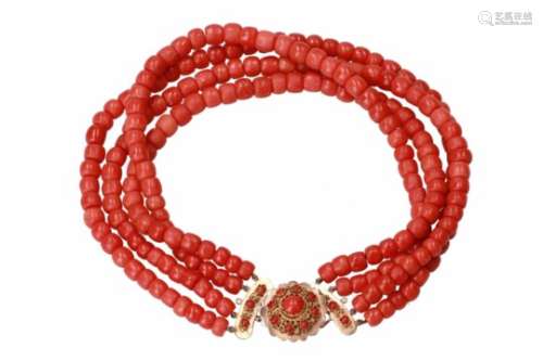 A four-strand red coral necklace with 14-kt golden clasp, set with red coral. Diam. approx. 7,8 -
