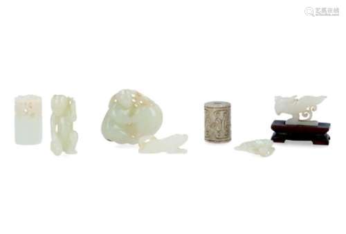 Lot of seven jade carvings, incl. a figure and animals. China, 19th/20th century. H. figure 4 cm.