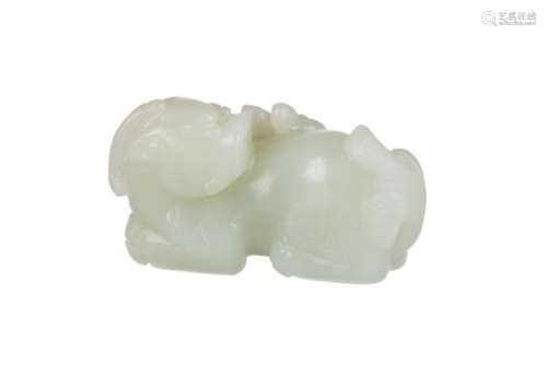 A carved jade chilong dragon. China, 20th century. L. 5,5 cm. H. 3 cm.