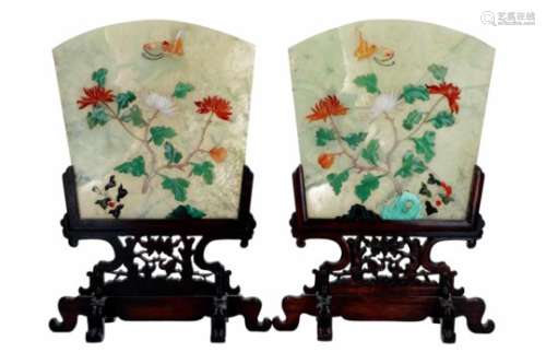 A pair of jade table screens in wooden frames, decorated with several types of stones, depicting