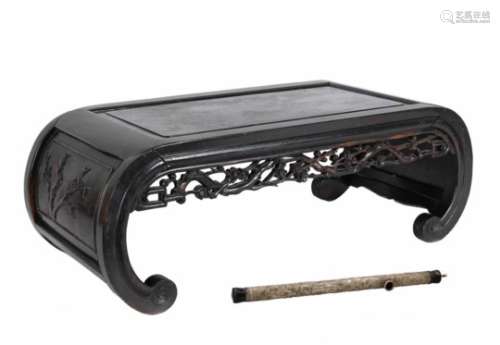 A wooden opium table. Added a silver opium pipe, decorated with dragons, salamanders and figures.