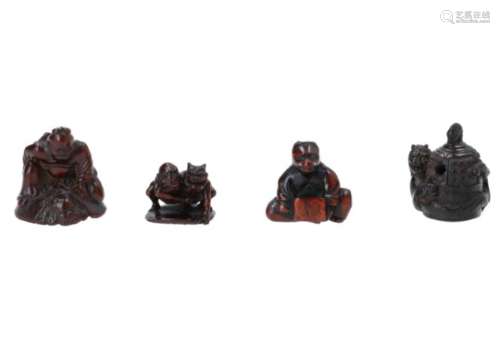 Lot of four netsuke, 1) wooden Shoki with Oni. Signed. H. 4,5 cm. 2) wooden Rakan with Oni on a