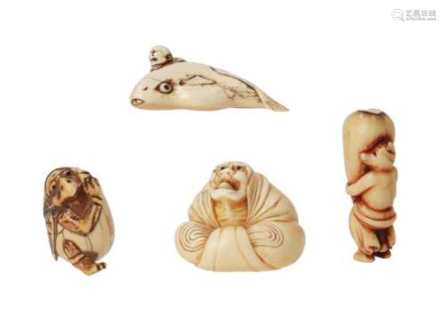 Lot of four netsuke, 1) ivory boy with fish. L. 5 cm. 2) staghorn Tanuki with stone. H. 5,5 cm. 3)