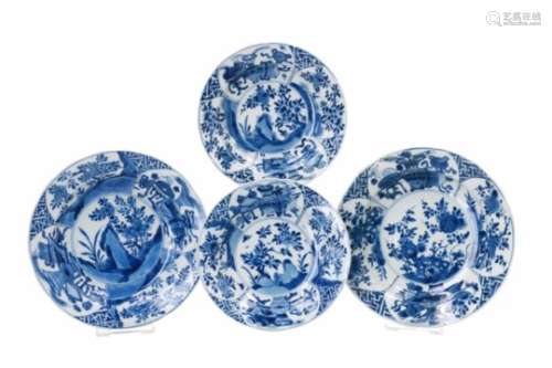 Lot of four blue and white porcelain deep saucers, decorated with flowers and antiquities. Marked