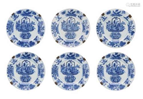 A set of six blue and white porcelain dishes, decorated with flowers and a flower vase. Unmarked.