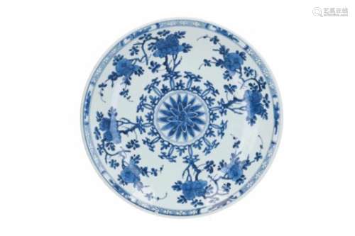 A blue and white porcelain charger, decorated with flowers. Marked with artemisia leaf. China,