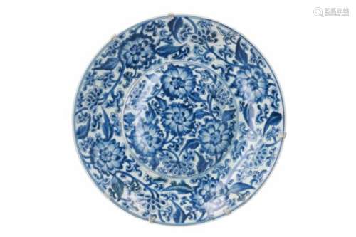 A blue and white porcelain deep charger, decorated with flowers. Marked with symbol. China,