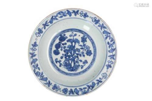 A blue and white 'kraak' porcelain deep charger, decorated with flowers and birds. Marked with