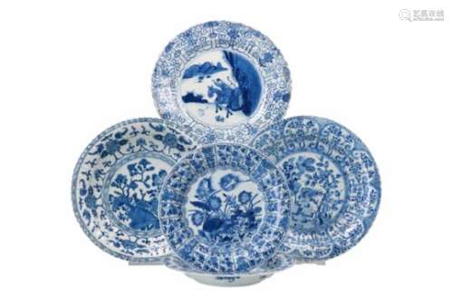 Lot of five diverse blue and white porcelain objects, 1) a deep dish, decorated with flowers and