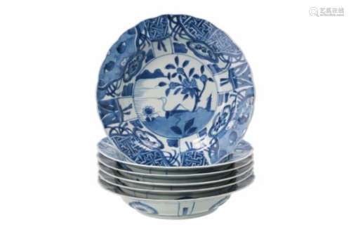 A set of six blue and white porcelain deep dishes, decorated with flowers. Unmarked. China, 18th/