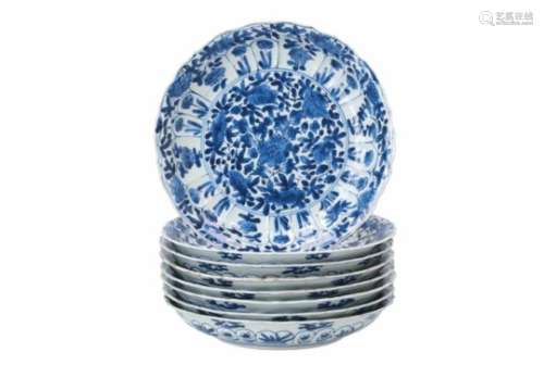 A set of eight blue and white porcelain dishes, decorated with flowers. Marked with 6-character mark
