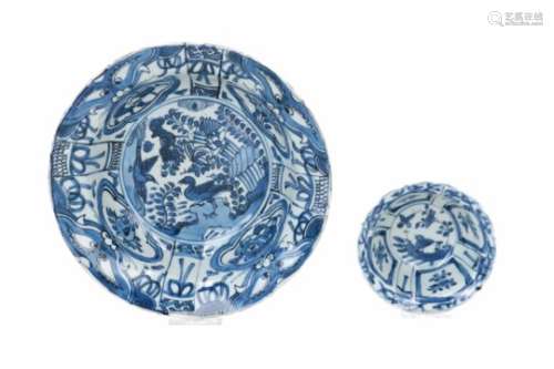 A blue and white porcelain 'klapmuts' bowl, decorated with birds, flowers and monster heads. Added a