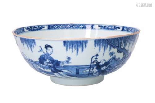 A blue and white porcelain bowl, decorated with playing little boys in a garden and flowers.