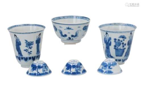 Lot of blue and white porcelain objects, 1) set of two cups, decorated with flowers and long Elizas.