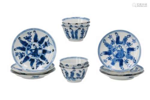 A set of six blue and white porcelain cups with saucers, decorated with long Elizas and flowers.