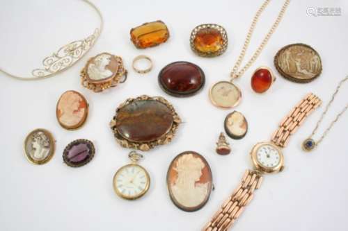 A QUANTITY OF JEWELLERY including various carved shell cameo brooches, a gold wristwatch etc.