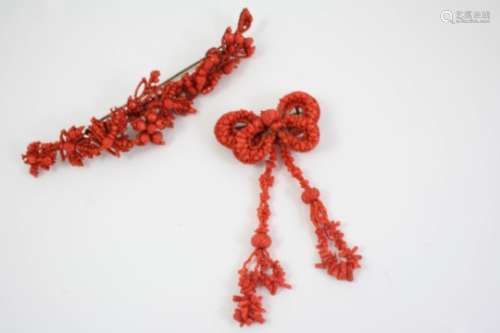 A VICTORIAN CORAL BROOCH of bow and tassel design, 10cm. long, together with another Victorian coral
