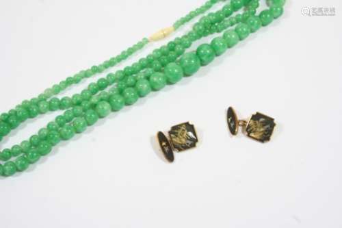A SINGLE ROW GRADUATED JADE BEAD NECKLACE the jade beads graduate from approximately 3.8 to 11.7mm.,