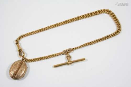 A 9CT. GOLD CURB LINK WATCH CHAIN with 9ct. gold 't' bar and suspending a gold plated locket,