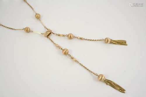 A 9CT. GOLD SAUTOIR NECKLACE formed alternately with rope and solid gold bar links, mounted with