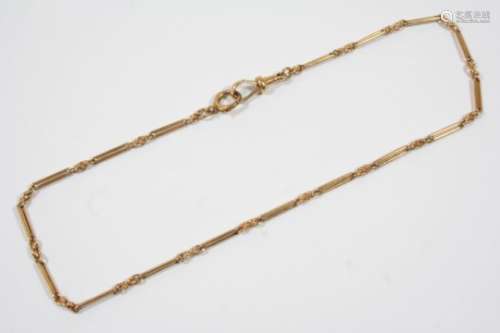 A 9CT. GOLD WATCH CHAIN formed with long and short links, stamped with maker's initials J.C. & S. to