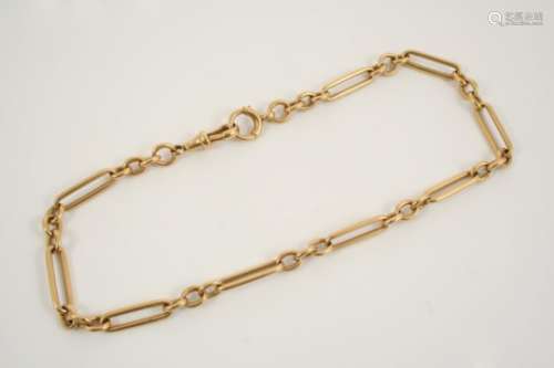 AN 18CT. GOLD WATCH CHAIN formed with long and short links, 36.5cm. long, 44.4 grams.