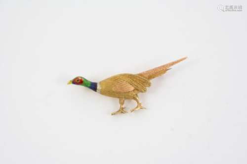 AN ENAMEL AND 15CT. GOLD PHEASANT BROOCH realistically formed, the head with green, blue and red