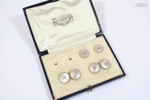 A CASED SET OF MOTHER OF PEARL AND GOLD CUFFLINKS AND BUTTONS comprising a pair of cufflinks and two