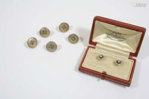 A PAIR OF DIAMOND AND BLACK ONYX DRESS BUTTONS mounted in platinum and 18ct. gold, with box,