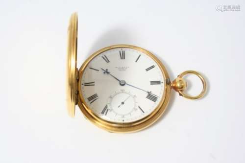 AN 18CT. GOLD FULL HUNTING CASED POCKET WATCH BY E.J. DENT, LONDON the signed white enamel dial with