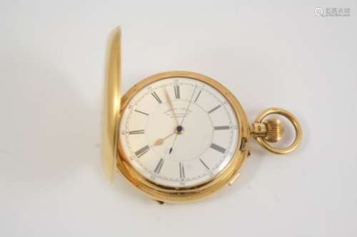 AN 18CT. GOLD FULL HUNTING CASED POCKET WATCH BY RUSSELLS LTD. the signed white enamel dial with