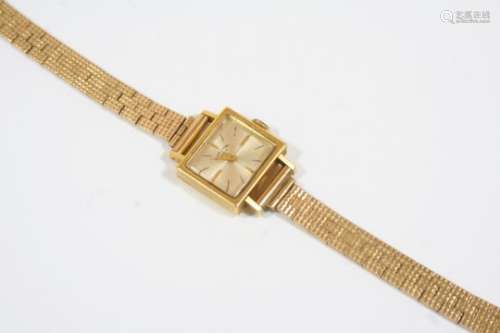 A LADY'S 18CT. GOLD WRISTWATCH BY FAVRE-LEUBA the signed rectangular-shaped dial with baton